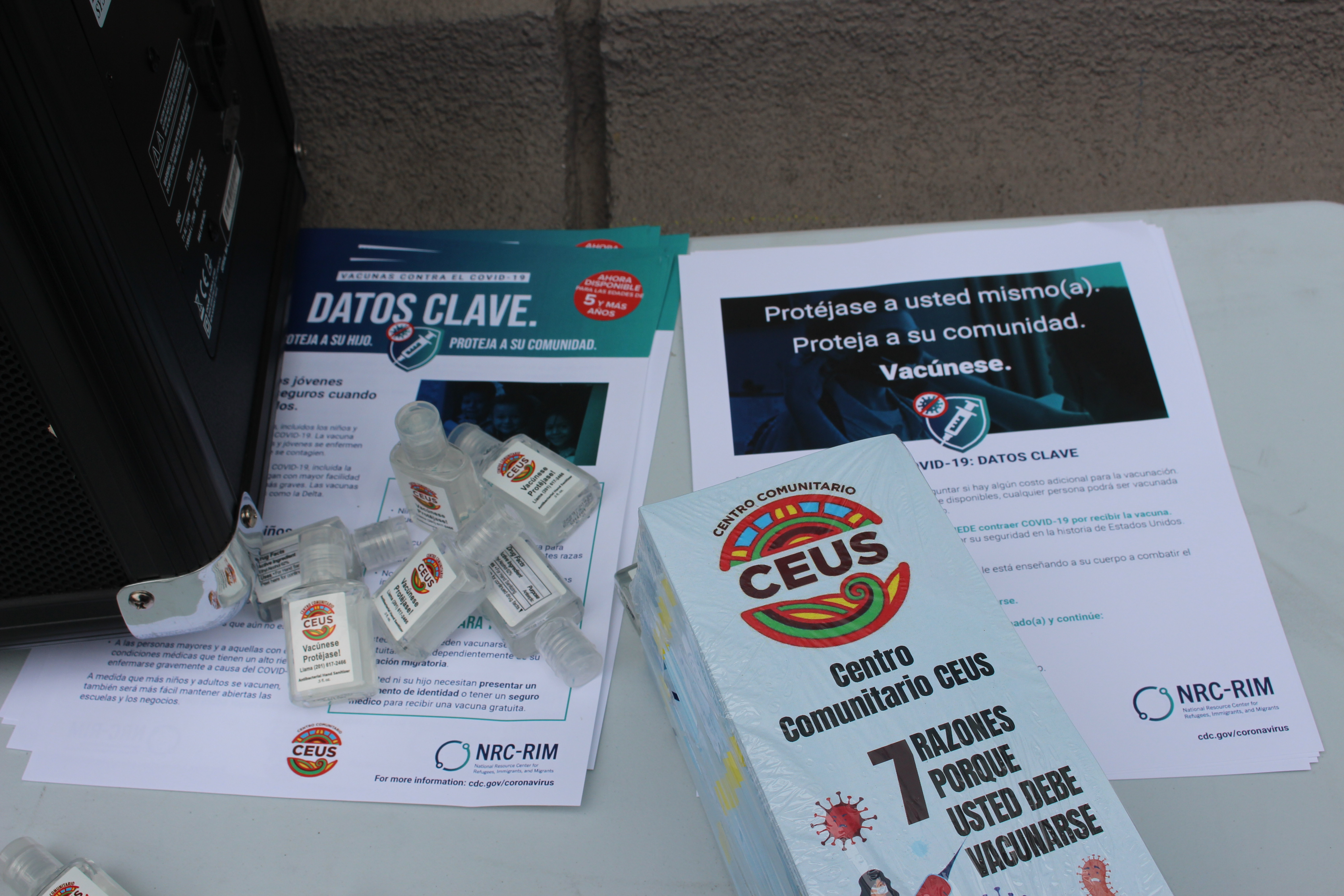 Centro Comunitario CEUS, a New Jersey nonprofit serving immigrants, displayed Spanish-language flyers explaining the need for vaccines from the National Resource Center for Refugees, Immigrants and Migrants. 