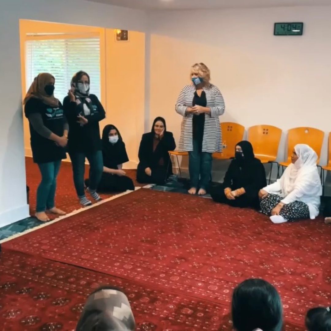 group of women in circle discussion