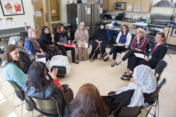 group of women in circle discussion